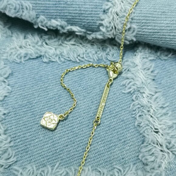 Kendra Scott Football Gold Orange Goldstone Short Pendant Necklace - Picture 3 of 3